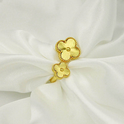 Large and small clover ring