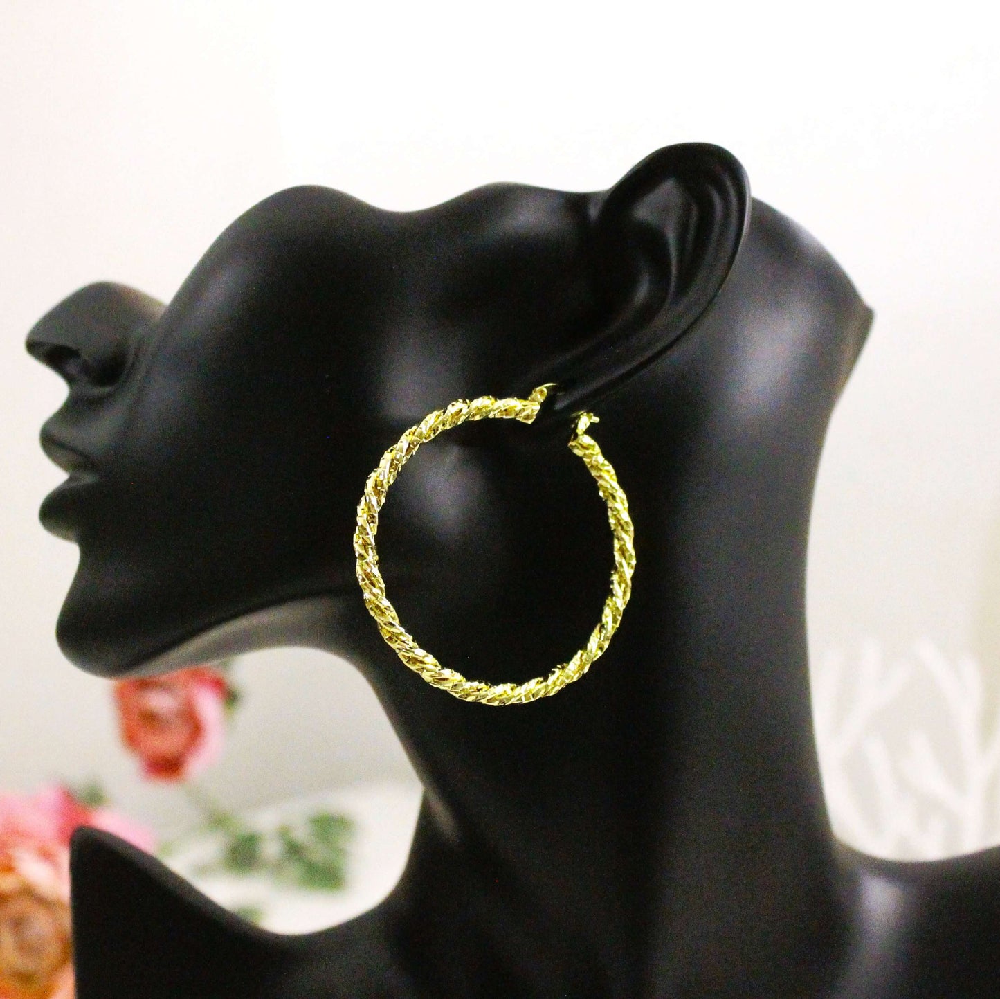 Large twisted hoop earrings